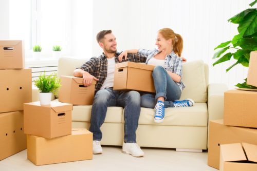 Young couple moving house; man with a van Cork