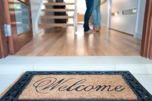 Welcome mat of a couple's new home