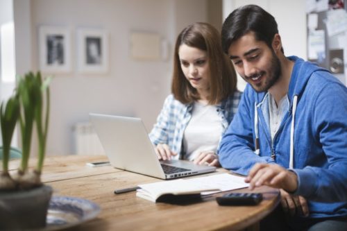 Couple determining the price for removals